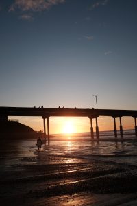 Surfer at sunset.