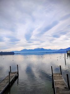 Chiemsee, a freshwater lake in Bavaria, Germany, with the Chiemgau Alps in the background.