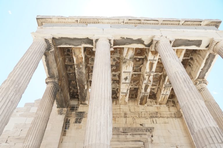 Looking up from under a Greek temple roof in Athens.