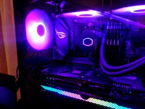 Inside of a gaming PC with fluorescent lighting.
