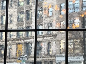 New York City street through crazed glass windows