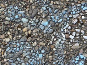 Rocky ground pattern with blue paint.