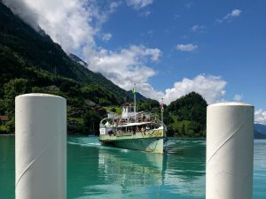 Paddle steamer approaching a pier on Lake Brienz, Switzerland