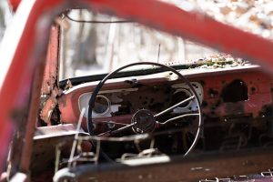 Abandoned vehicle in the woods