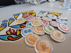 View larger photo: WordPress.org contributor pins on a table at WC Chiclana 2017.