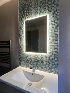 Illuminated bathroom mirror