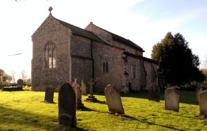 View larger photo: Norfolk Church yard with gravestones in the foreground