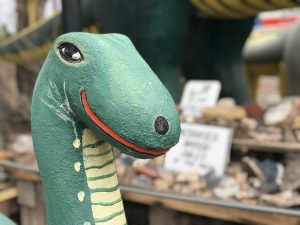 Dinosaur statue at a rock shop