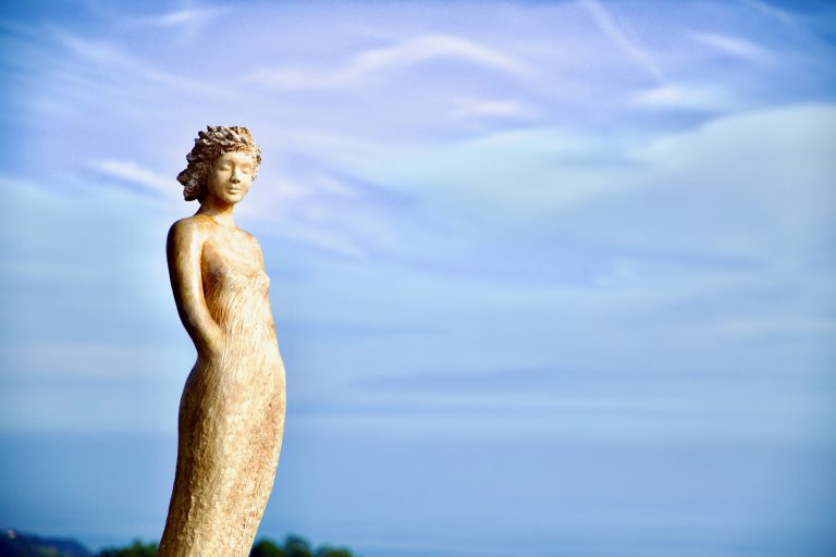 Statue watching over the sea and sky