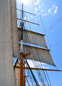 Pirate Ship Sails Against Blue Sky