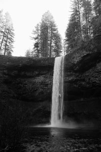 Black and white photo of a waterfall