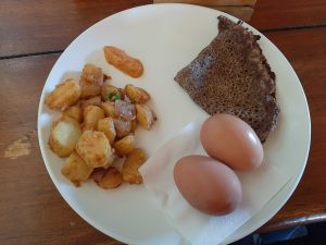 Breakfast from Himalayas – Millet Bread, Spicy Potato, Pickle, and Eggs
