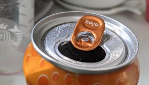 Beverage can top with a pull tab that says "Heya"