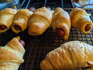 View larger photo: Sausages in croissants