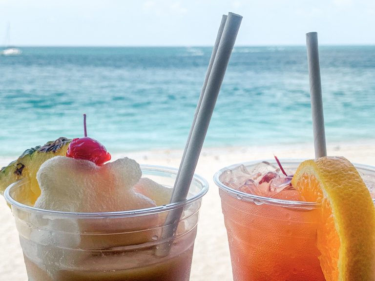 Two colorful drinks at the beach