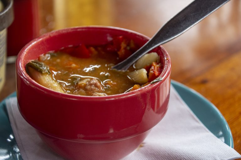 Small cup of vegetable and sausage stew