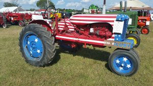 Red white and blue tractor