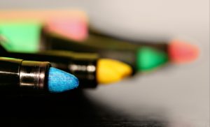 Multi-color highlighter pens in a row