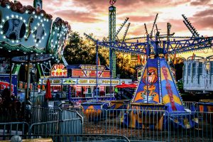 Carnival rides at sunset