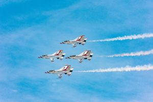 US Air Force Thunderbird planes in formation at an air show