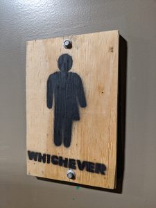 View larger photo: Bathroom gender sign