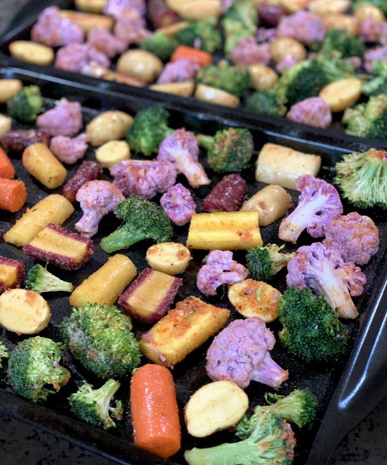 Roasting Vegetables: Broccoli, Carrots, Potatoes, And Purple Cauliflower