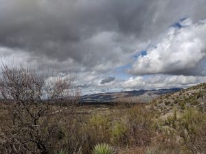 Low clouds over a dessert hill in Arizona