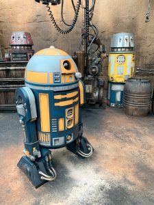 Blue and yellow astromech droid