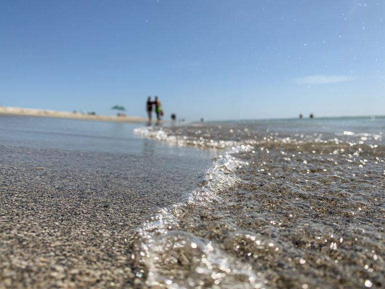 Close-up of small waving coming onto the beach