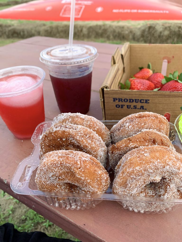 Sugar donuts, strawberries, and blueberry lemonade