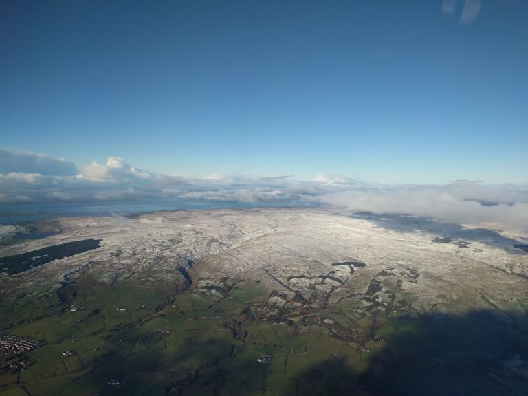 In a plane above Scotland.