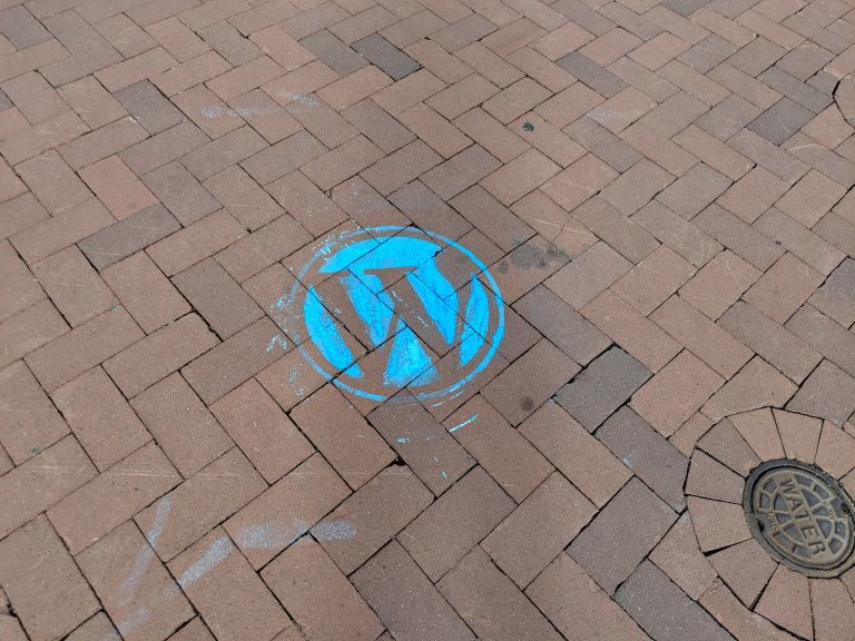 WordPress logo chalked on the ground