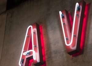 Neon letters on a wall