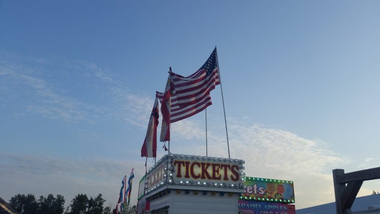 Flags over a conession stand, summer carnival