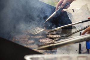 Multiple hamburgers on a grill