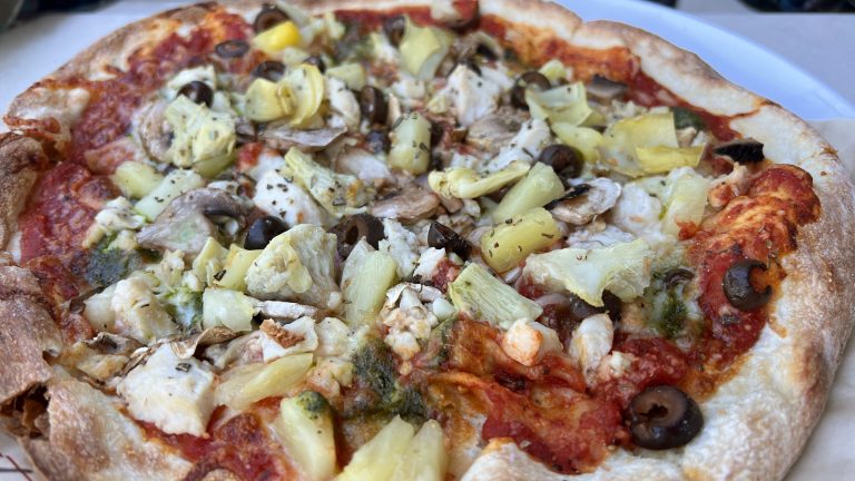 Chicken and artichoke thin crust pizza