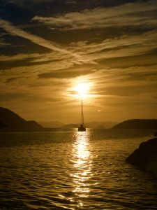 Silhouette of a boat at sunset