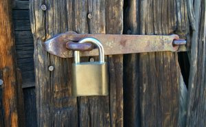 View larger photo: Security Lock On An Old Wood Barn Door