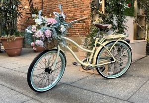 View larger photo: Yellow beach cruiser bicycle with flowers