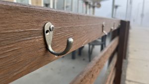 Coat hooks on a foggy morning