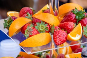 Small platter of strawberries and oranges