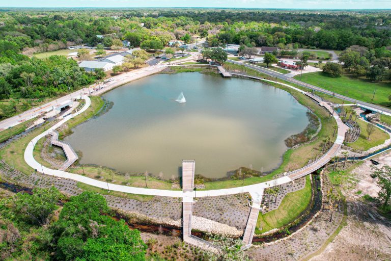 Aerial view of a small park and lake in Oviedo, Florida