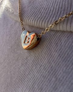 Necklace with a "B" charm