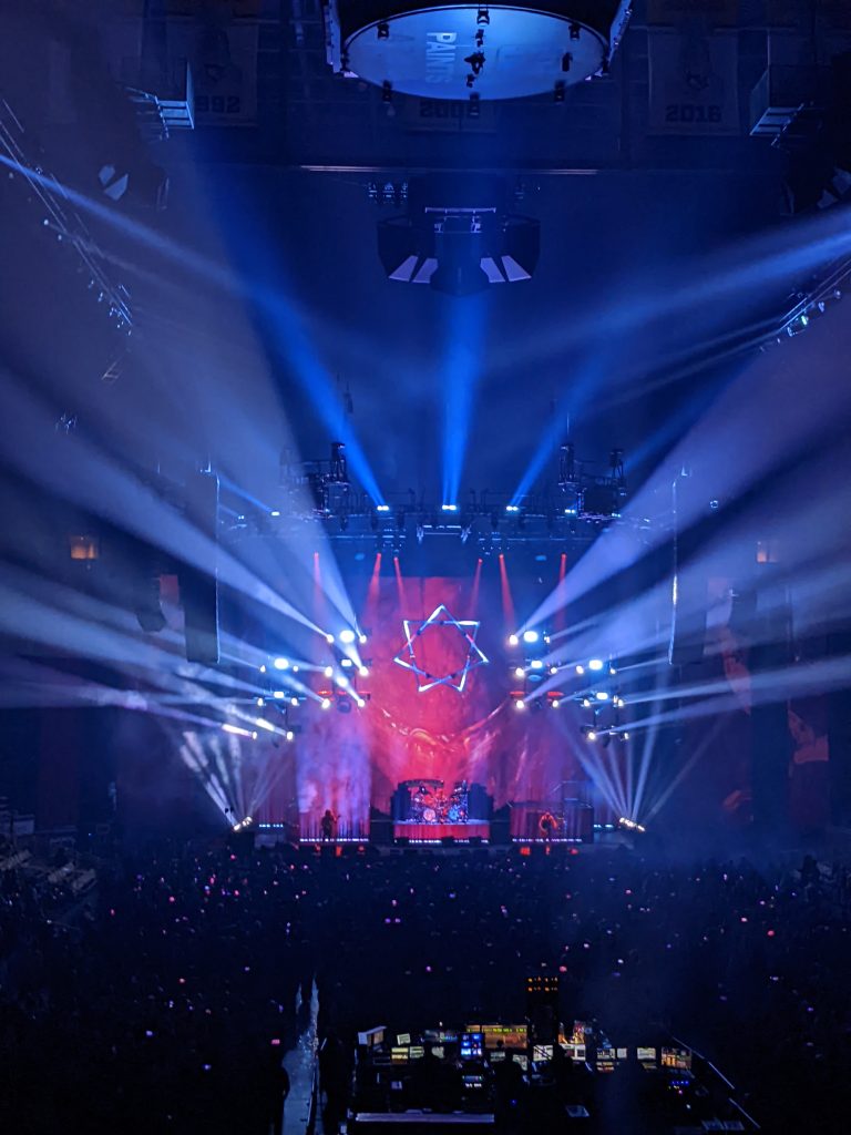 Blue lights coming from a concert stage