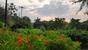 Nature, trees, flowers and statue