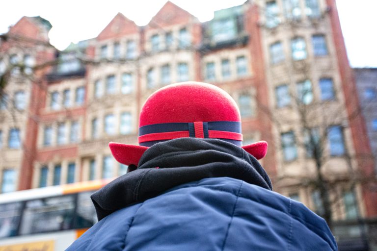 A man in the red hat