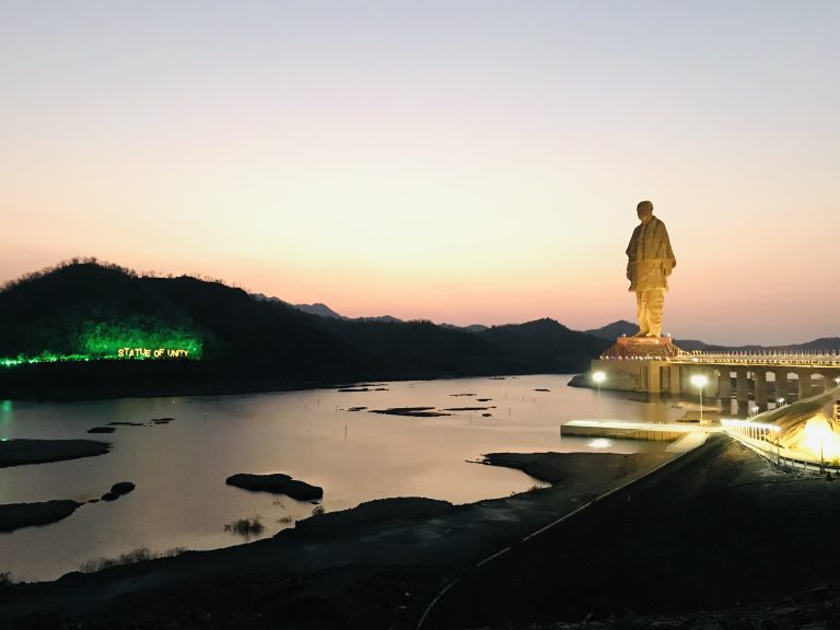 Statue, water, sky, mountain