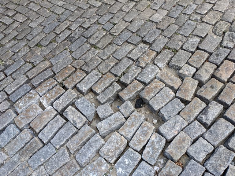 Cobblestone street with some gaps, a layout in need of some work.