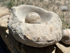 Ancient puebloan griding rock and pestle