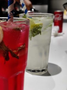 Two cocktail drinks on a table

